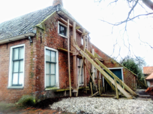 Image of home damaged by earthquake.